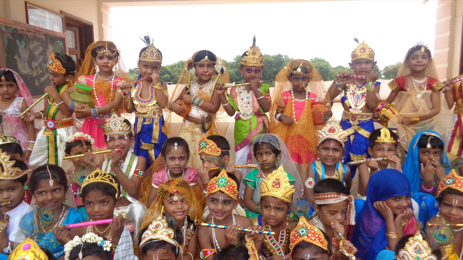 Children in festival costumes at Alagappa Academy